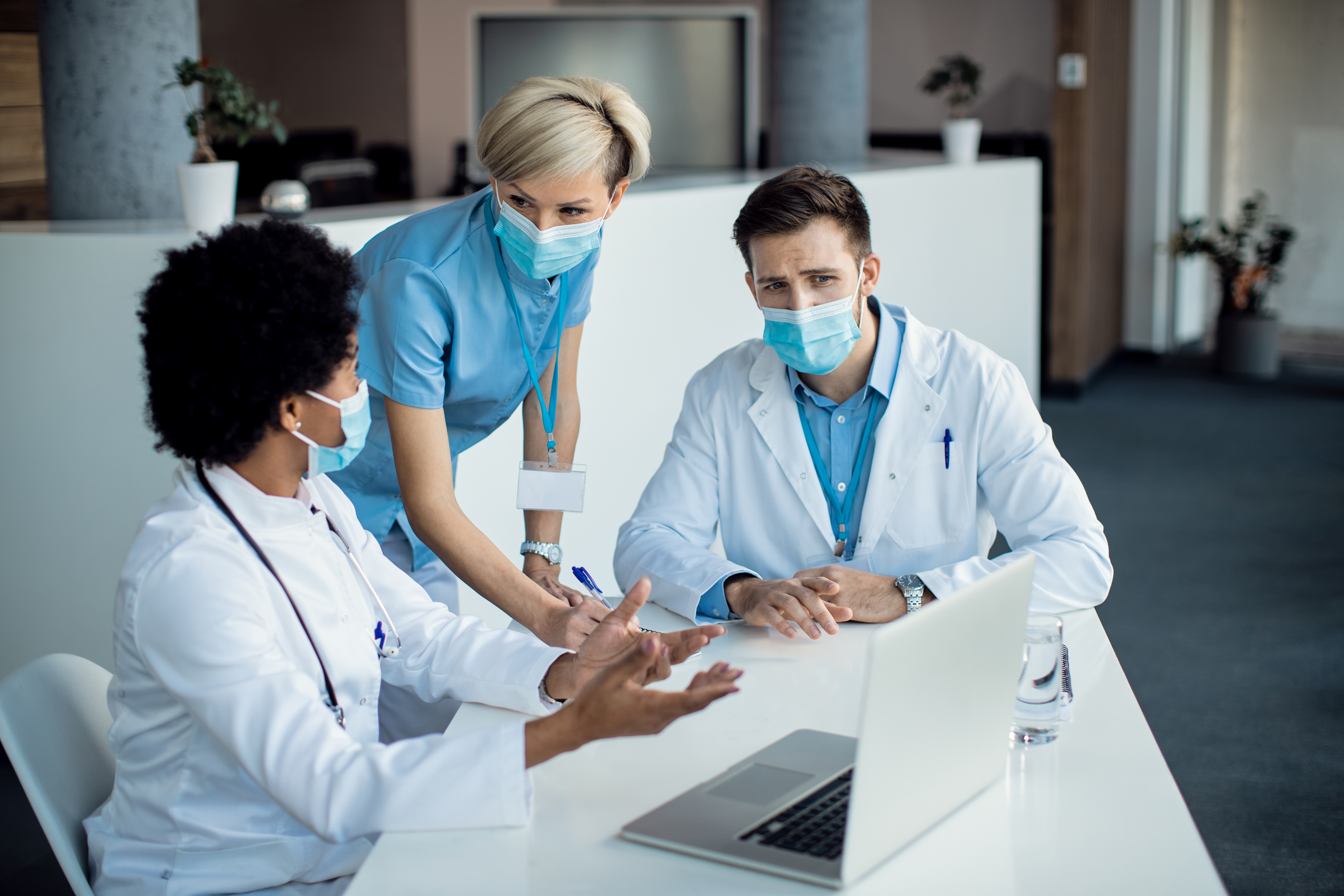 Healthcare team collaborating using digital patient portal